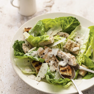 chicken ceasar salad on plate