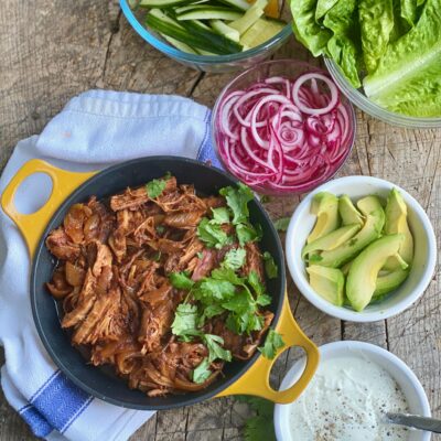 Pulled pork with pickled onions, avocado and soured cream